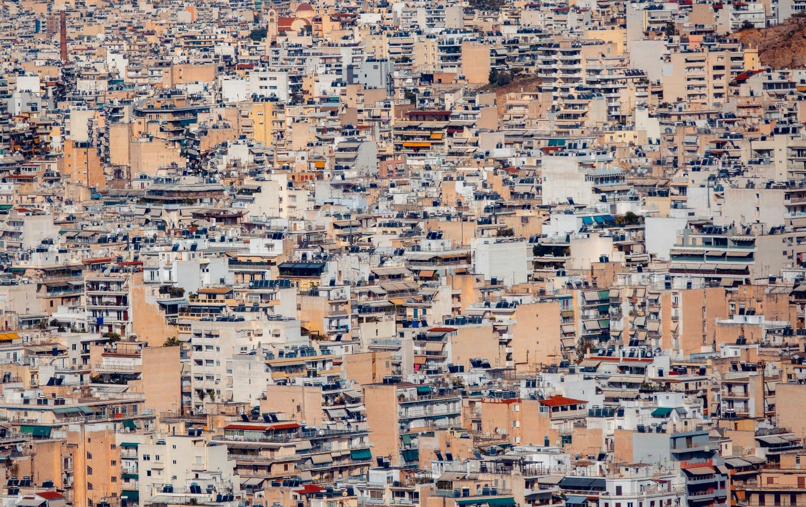 Dense residential buildings in a city (illustrative image)
